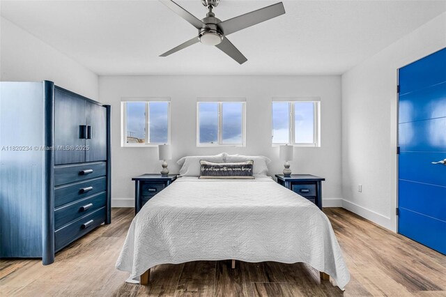 94825 Overseas Hwy, Key Largo, FL 33037 - bedroom featuring wood finished floors and ceiling fan