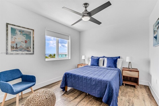 94825 Overseas Hwy, Key Largo, FL 33037 - bedroom featuring wood finished floors and a ceiling fan