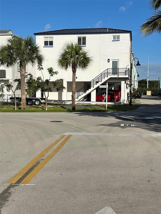 94825 Overseas Hwy, Key Largo, FL 33037 - view of property with stairway