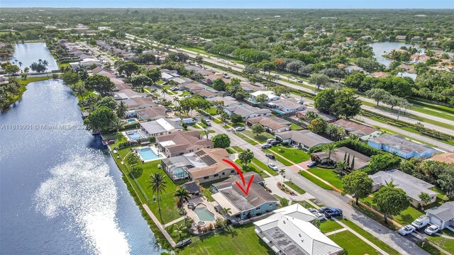 11520 NW 23rd St, Pembroke Pines, FL 33026 - aerial perspective of suburban area featuring a large body of water