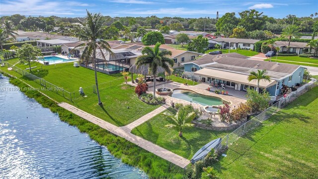 11520 NW 23rd St, Pembroke Pines, FL 33026 - aerial perspective of suburban area with a pool area and a nearby body of water