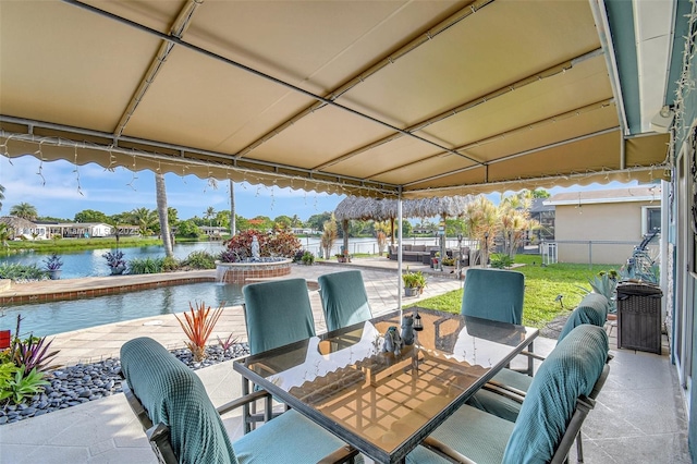 11520 NW 23rd St, Pembroke Pines, FL 33026 - view of patio / terrace featuring outdoor dining space and a water view