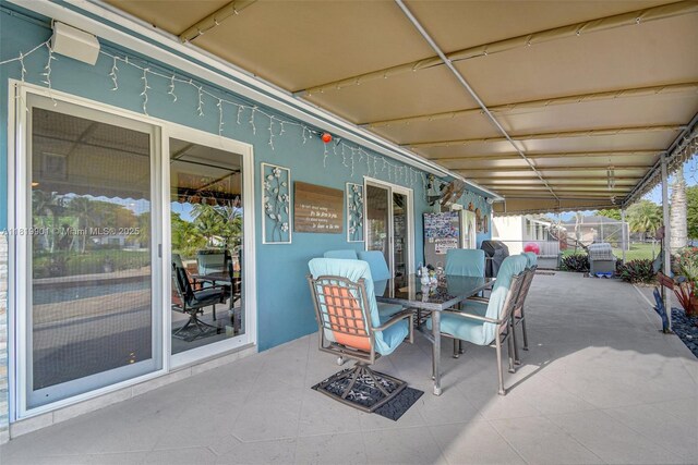 11520 NW 23rd St, Pembroke Pines, FL 33026 - view of patio with outdoor dining area