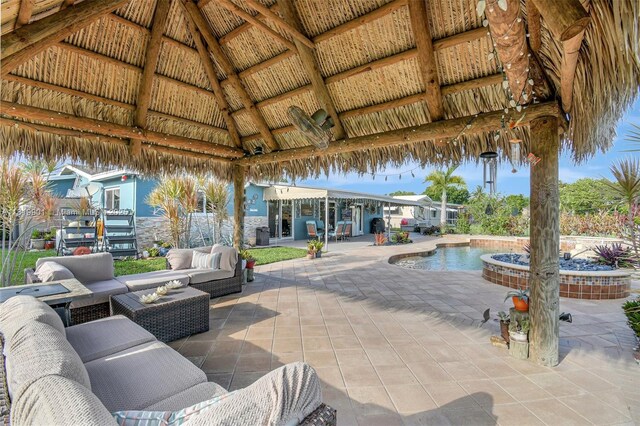 11520 NW 23rd St, Pembroke Pines, FL 33026 - view of patio / terrace with a gazebo, an outdoor hangout area, and an outdoor pool