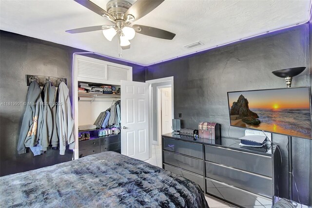 11520 NW 23rd St, Pembroke Pines, FL 33026 - bedroom with a closet, ceiling fan, and tile patterned flooring