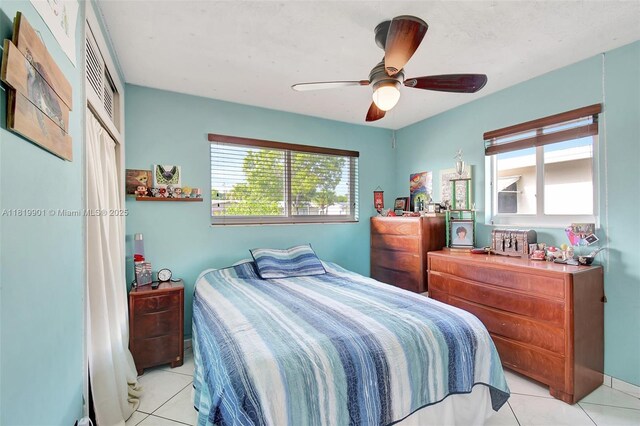 11520 NW 23rd St, Pembroke Pines, FL 33026 - bedroom with light tile patterned flooring and a ceiling fan