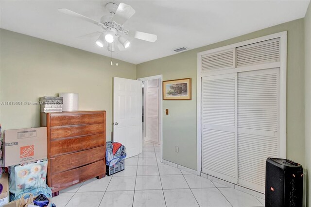 11520 NW 23rd St, Pembroke Pines, FL 33026 - bedroom featuring a closet, light tile patterned floors, and ceiling fan