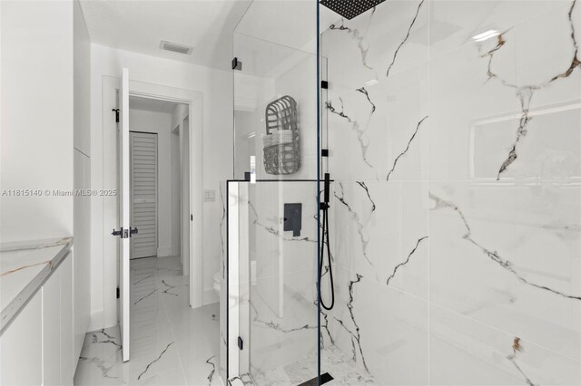 1365 SW 14th St, Boca Raton, FL 33486 - bathroom featuring a marble finish shower, marble finish flooring, and vanity