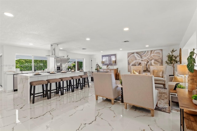 1365 SW 14th St, Boca Raton, FL 33486 - living area with recessed lighting and light marble finish floors