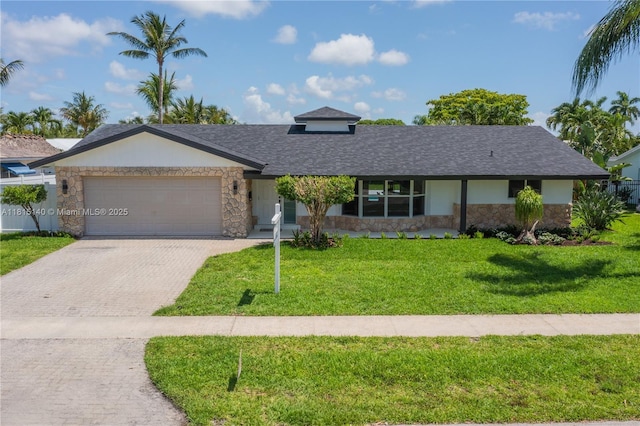 1365 SW 14th St, Boca Raton, FL 33486 - view of front facade featuring stone siding, driveway, a front yard, a garage, and roof with shingles