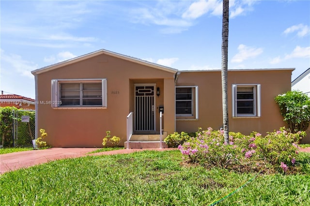 3685 SW 26th St, Miami, FL 33133 - view of front of home featuring stucco siding