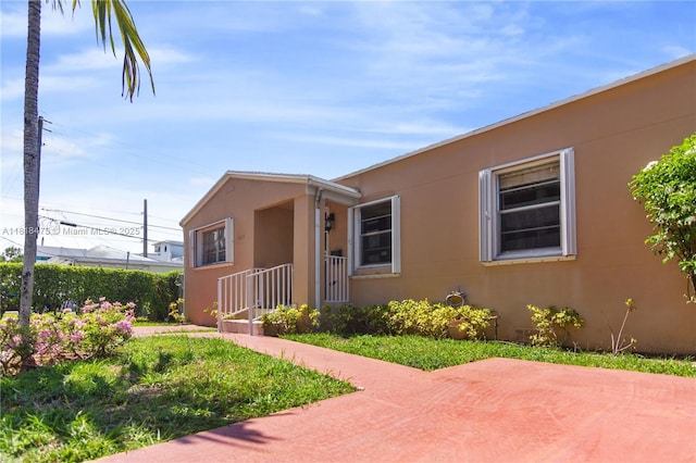 3685 SW 26th St, Miami, FL 33133 - view of front of home with stucco siding