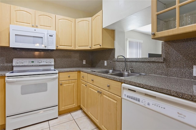 3685 SW 26th St, Miami, FL 33133 - kitchen featuring white appliances, light brown cabinetry, light tile patterned floors, glass insert cabinets, and decorative backsplash