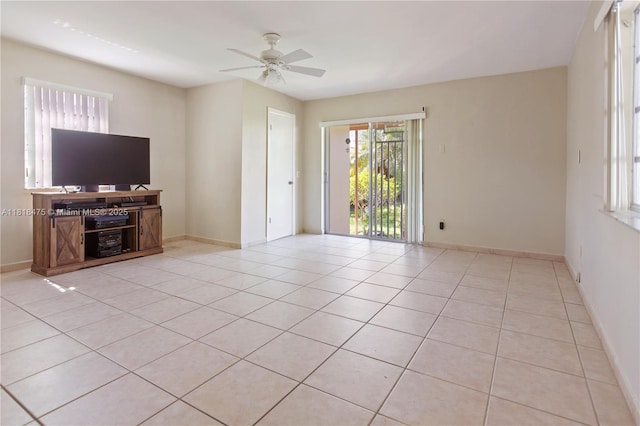 3685 SW 26th St, Miami, FL 33133 - unfurnished living room featuring ceiling fan and light tile patterned flooring