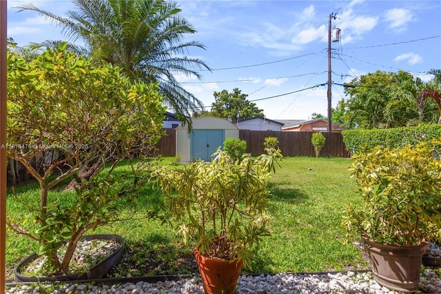 3685 SW 26th St, Miami, FL 33133 - fenced backyard featuring a storage shed