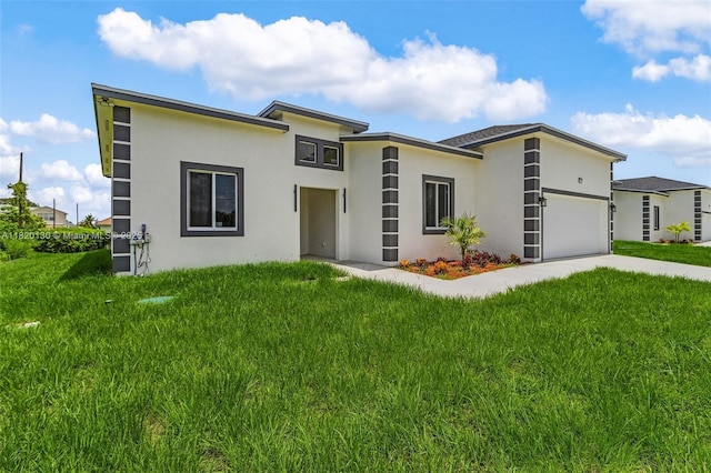 3512 2nd St W, Lehigh Acres, FL 33971 - prairie-style house featuring stucco siding, a garage, a front lawn, and driveway