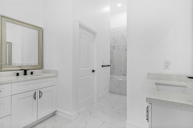 3512 2nd St W, Lehigh Acres, FL 33971 - full bathroom featuring marble finish flooring and vanity