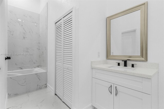 3512 2nd St W, Lehigh Acres, FL 33971 - bathroom featuring a closet, marble finish flooring, and vanity