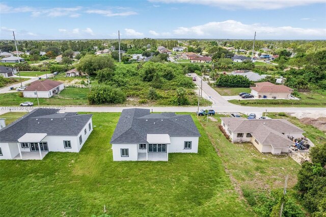 3512 2nd St W, Lehigh Acres, FL 33971 - aerial perspective of suburban area
