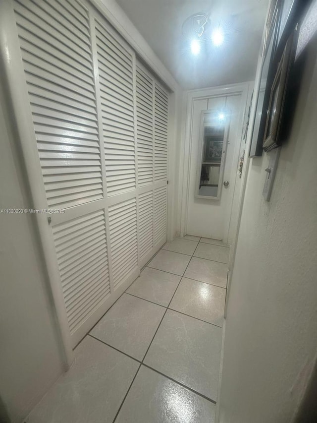 1540 NE 191st St Unit 140, Miami, FL 33179 - corridor featuring tile patterned floors