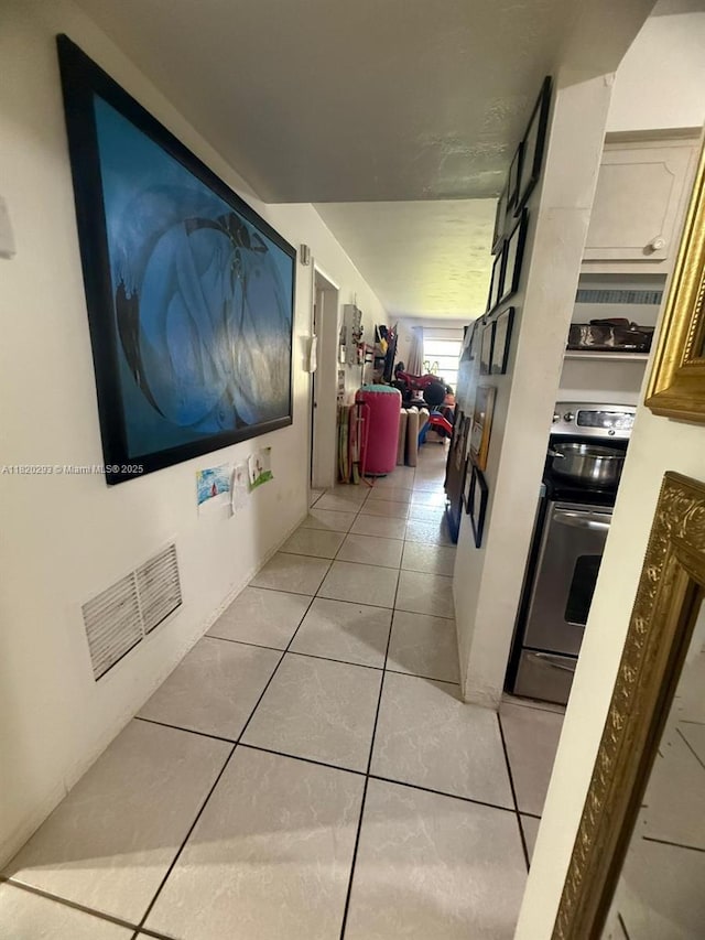 1540 NE 191st St Unit 140, Miami, FL 33179 - hall featuring light tile patterned floors