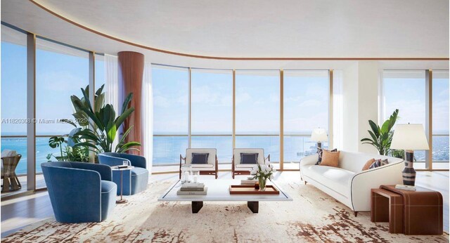 1420 S Miami Ave Unit 5304, Miami, FL 33130 - living room featuring a water view, healthy amount of natural light, a wall of windows, and wood finished floors