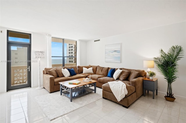 10185 Collins Ave Unit 1508, Bal Harbour, FL 33154 - living area with healthy amount of natural light and light tile patterned floors