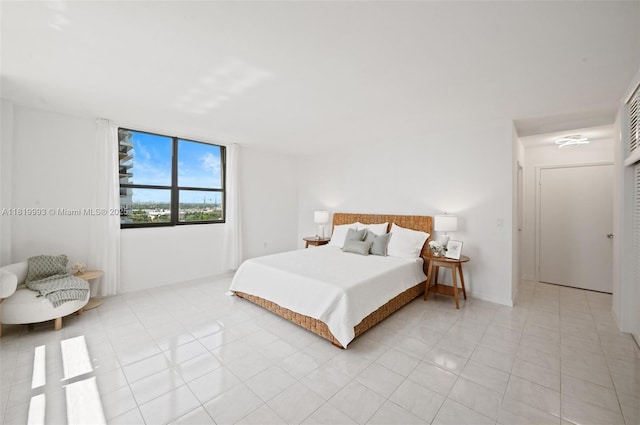 10185 Collins Ave Unit 1508, Bal Harbour, FL 33154 - bedroom with light tile patterned floors