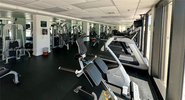 10185 Collins Ave Unit 1508, Bal Harbour, FL 33154 - workout area featuring a drop ceiling