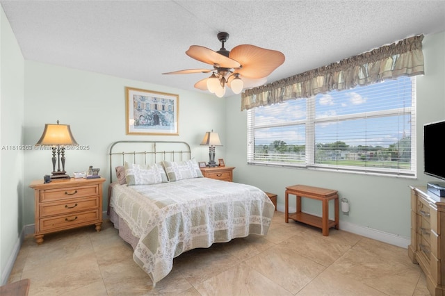 7608 NW 18th St Unit 405, Margate, FL 33063 - bedroom featuring a ceiling fan and a textured ceiling