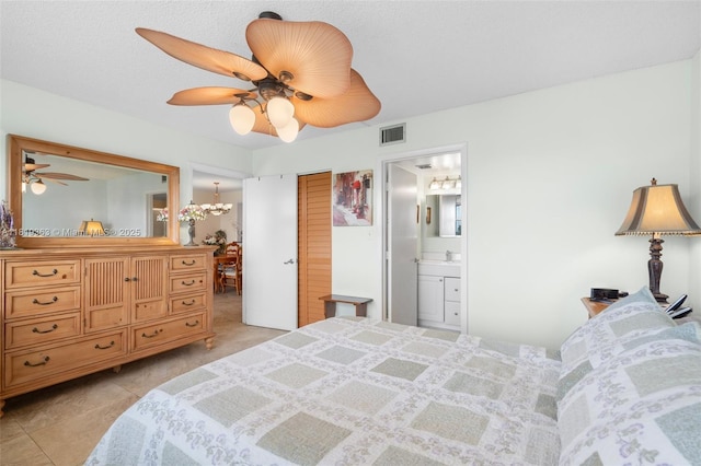 7608 NW 18th St Unit 405, Margate, FL 33063 - bedroom with ensuite bathroom, ceiling fan, and light tile patterned floors
