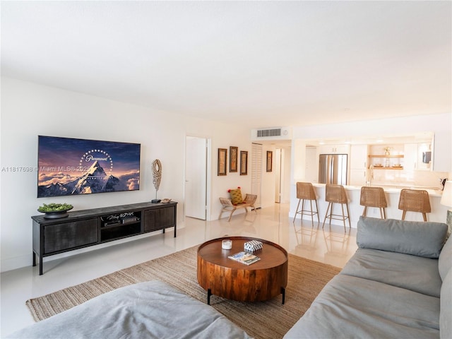 5701 Collins Ave Unit 307, Miami Beach, FL 33140 - living area with light tile patterned flooring