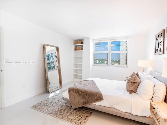 5701 Collins Ave Unit 307, Miami Beach, FL 33140 - bedroom featuring baseboards