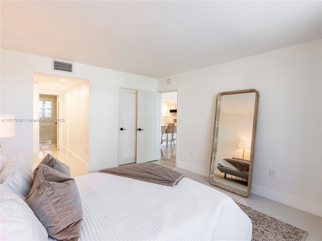 5701 Collins Ave Unit 307, Miami Beach, FL 33140 - bedroom featuring baseboards