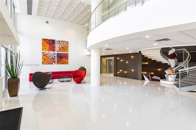 5701 Collins Ave Unit 307, Miami Beach, FL 33140 - building lobby featuring a towering ceiling