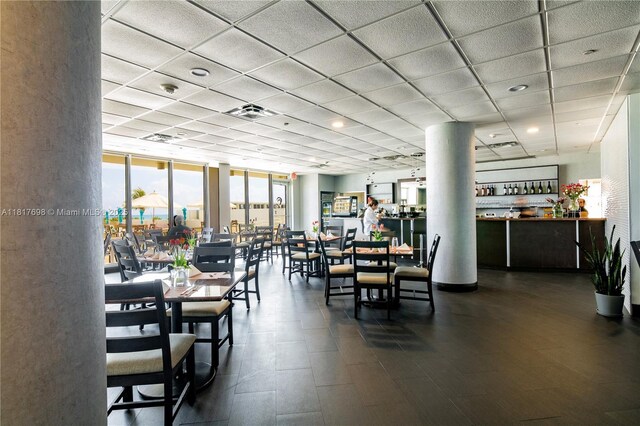 5701 Collins Ave Unit 307, Miami Beach, FL 33140 - dining space with a paneled ceiling and recessed lighting
