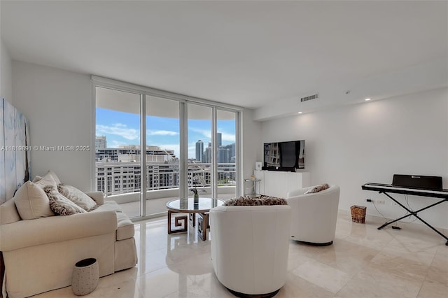 848 Brickell Key Dr Unit 1803, Miami, FL 33131 - living area with floor to ceiling windows and light tile patterned floors