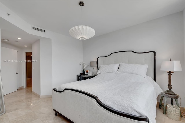 848 Brickell Key Dr Unit 1803, Miami, FL 33131 - bedroom featuring recessed lighting and light marble finish floors