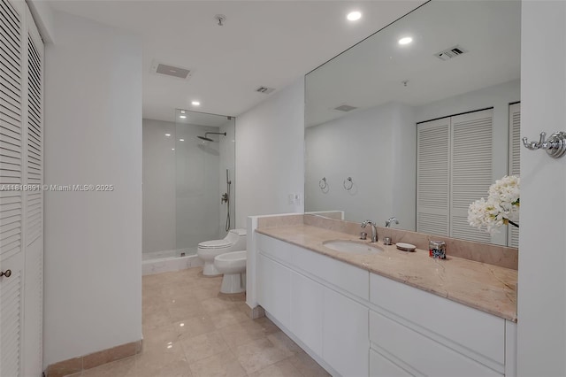 848 Brickell Key Dr Unit 1803, Miami, FL 33131 - bathroom featuring a closet, a stall shower, a bidet, recessed lighting, and vanity