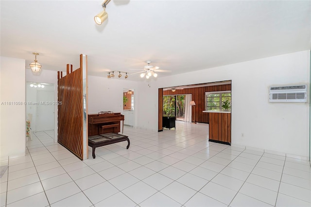 8701 SW 80th St, Miami, FL 33173 - empty room featuring a wall mounted AC, a ceiling fan, track lighting, and light tile patterned floors