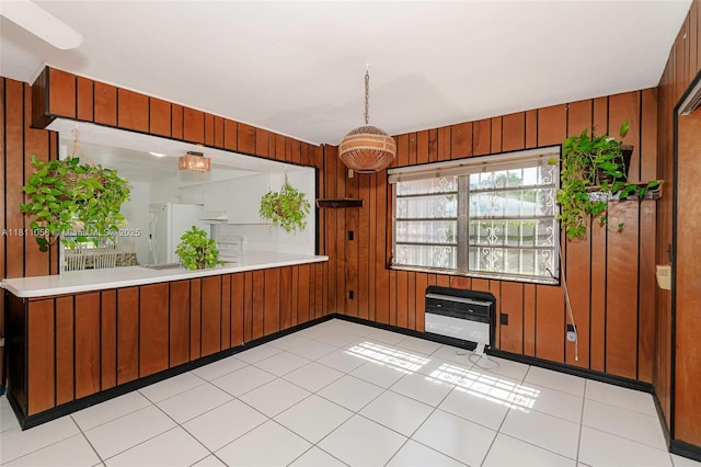8701 SW 80th St, Miami, FL 33173 - unfurnished dining area featuring wooden walls and heating unit