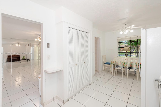 8701 SW 80th St, Miami, FL 33173 - corridor featuring light tile patterned floors and baseboards