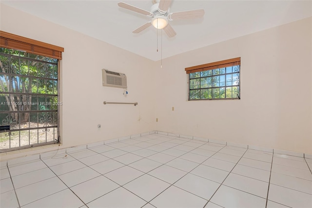 8701 SW 80th St, Miami, FL 33173 - unfurnished room with an AC wall unit and a ceiling fan