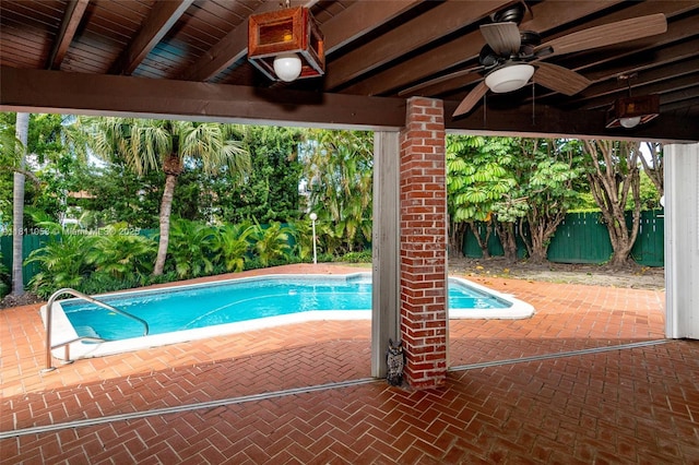8701 SW 80th St, Miami, FL 33173 - view of swimming pool with a ceiling fan, a fenced backyard, and a patio area