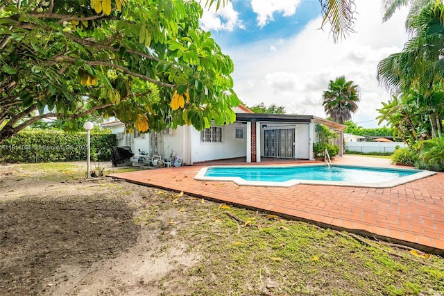8701 SW 80th St, Miami, FL 33173 - view of swimming pool featuring a patio