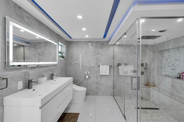 4140 N 36th Ave, Hollywood, FL 33021 - bathroom featuring tile walls, double vanity, a marble finish shower, recessed lighting, and tile patterned flooring