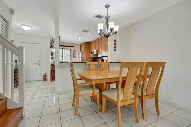 20865 NW 3rd Ln, Pembroke Pines, FL 33029 - dining area with a chandelier, stairs, and light tile patterned floors