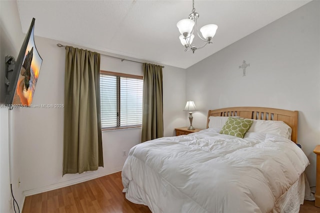 20865 NW 3rd Ln, Pembroke Pines, FL 33029 - bedroom with a chandelier, vaulted ceiling, and wood finished floors