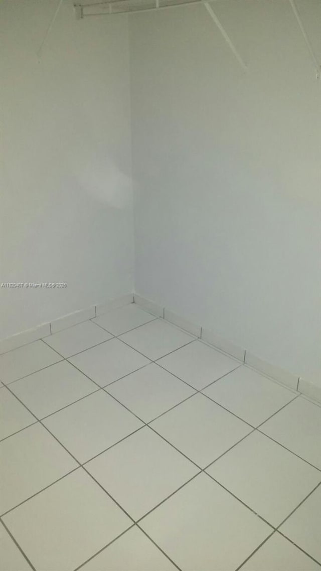 9810 Hammocks Blvd Unit 202, Miami, FL 33196 - spacious closet featuring tile patterned floors