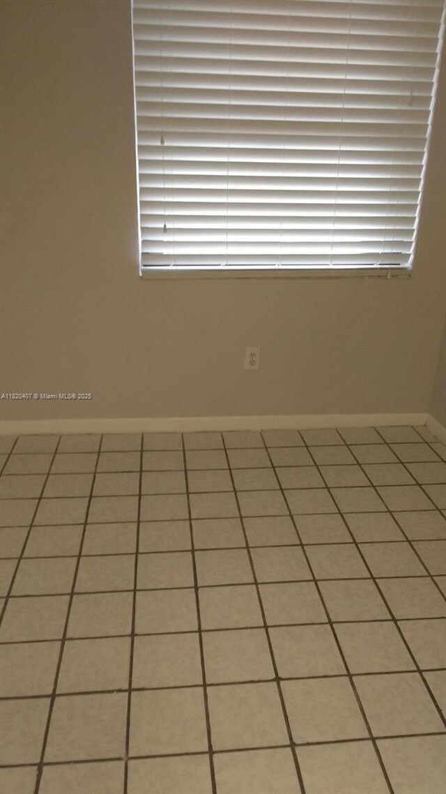 9810 Hammocks Blvd Unit 202, Miami, FL 33196 - empty room with baseboards